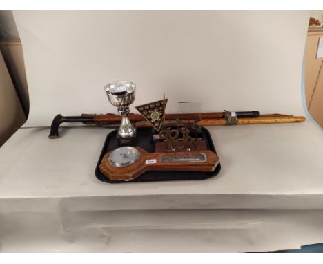 A mixed lot including two Pool League trophies, an oak barometer, a letter rack, two carved walking sticks plus a vintage ash