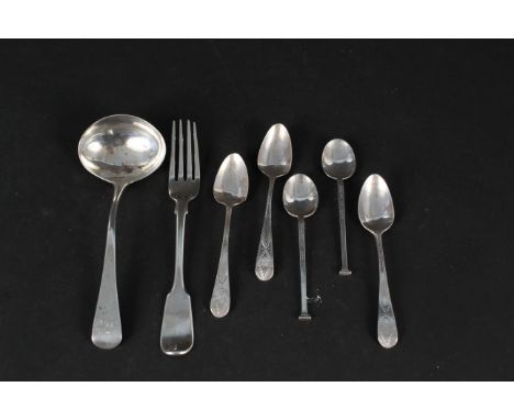 A Georgian silver sauce ladle, hallmarked London 1801, a Victorian silver spoon and five various silver teaspoons, weight app