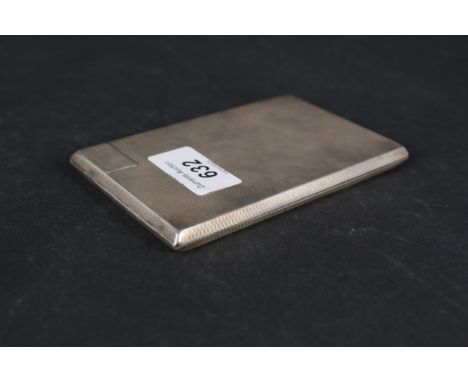 A large silver cigarette case with engine turned decoration, hallmarked Birmingham 1933, maker S Blackensee &amp; Son Ltd, we