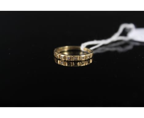 An 18ct gold half eternity ring set with small diamonds (wear to shank and setting), size J 1/2, weight approx 2g