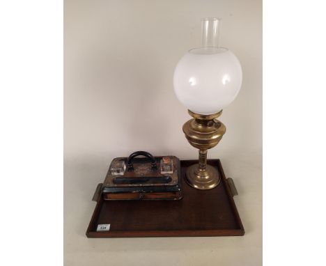 A Victorian burr walnut and ebonised desk inkwell/pen stand with drawer, two inkwells and brass mounts plus a 1930's oak tray