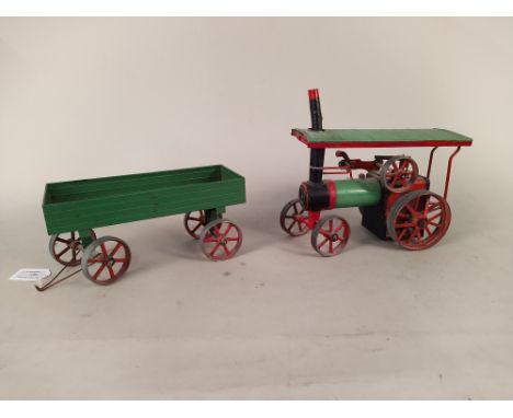A Mamod traction engine with matching trailer
