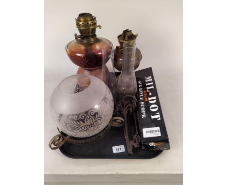 An oil lamp and parts, boxed air rifle scope, keys etc