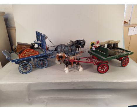 Two ceramic horses with drays plus a small shire and two carts