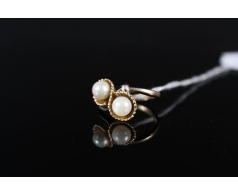 A 9ct gold crossover pearl set ring, size I, weight approx 3.5g