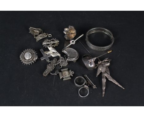 A mixed lot of silver and white metal jewellery including brooches, bangle, ring etc