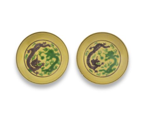 A PAIR OF YELLOW-GROUND GREEN AND AUBERGINE-ENAMELLED 'DRAGON' SAUCER-DISHESGuangxu six-character marks and of the period Eac