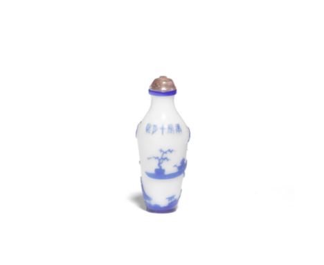 A BLUE OVERLAY MILKY-WHITE GLASS SNUFF BOTTLECylically dated to the tenth month of the Gengchen Year, corresponding to 1856 a