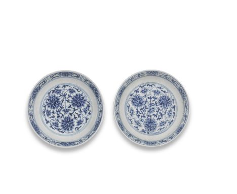 A PAIR OF BLUE AND WHITE 'LOTUS' SAUCER-DISHESGuangxu six-character marks and of the periodEach painted in the centre with a 