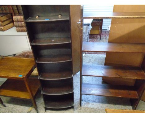 A 1930s oak waterfall bookcase, a four shelf pitch pine open shelf wall hanging unit, and an oak two tier trolleyLocation: G 