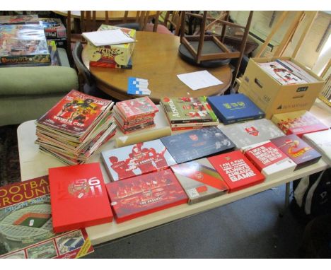 A large collection of modern Arsenal memorabilia to include programmes, magazines, membership boxsets and DVD'sLocation: BWR 