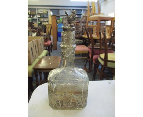 A 19th century Continental acid etched glass decanter with white metal sleeve and collar with later stopper, 27cm highLocatio