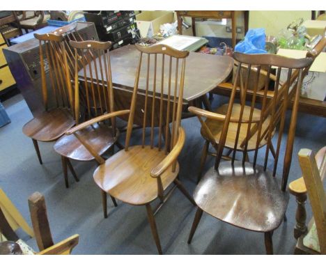 A 20th century Ercol drop leaf dining table and six chairs to include three carversLocation: LAF 