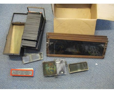a box of approx. 50 early 20th century coloured magic lantern slides of different Canadian provinces to include street views,