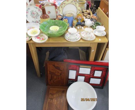 A large miscellaneous lot comprising retro dolls of the World, woodblock pictures, a modern Clintons frame, ornaments and mix