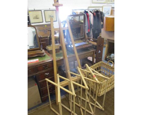 An artist's easel, a folding washing/drying stand and a large twin handled basket. The easel is 171cm h x 56cm w at the wides