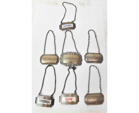 TURNER &amp; SIMPSON LTD; a set of three Elizabeth II hallmarked silver and enamel decanter labels for Gin, Scotch, and Brand