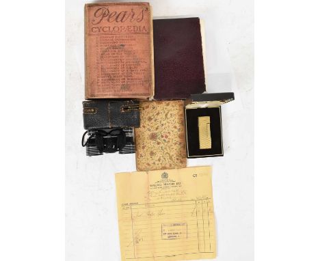 A boxed gold plated Dunhill lighter, Perl opera glasses and three sundry books.