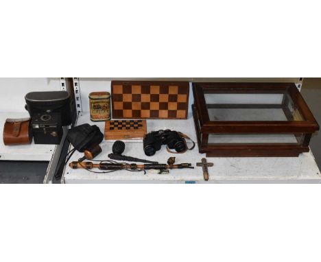 A quantity of collectors' items to include binoculars, cameras, travelling chess sets, etc.