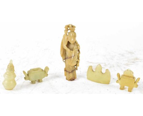 Four Chinese green hardstone objects, possibly jade and a soapstone carving (4).