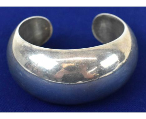 An Indian silver torc bangle, 96.6g.