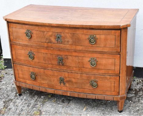 A antique Northern European walnut three drawer bowfronted commode, width 118cm.
