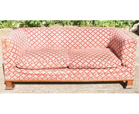 A late 19th century upholstered Chesterfield sofa on substantial square supports, width 180cm.