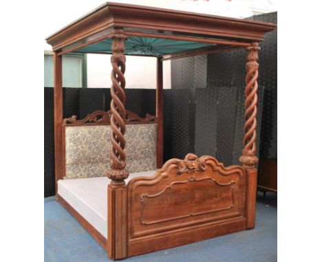 A Victorian 19th century mahogany 4 poster bed of large proportions with double helix twist bed posts united by printed fabri