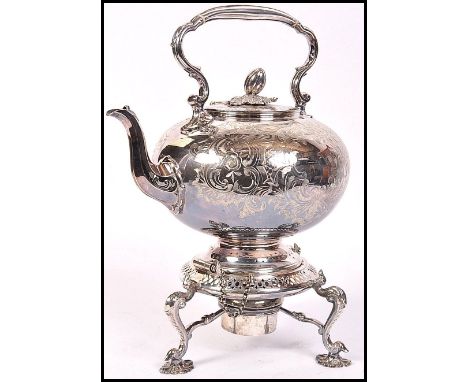 A fantastic 19th century Victorian silver plated spirit burner picnic kettle raised on tripod scrolled leg with leaf feet the