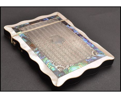 A 19th Century Victorian tortoiseshell, silver, abalone shell and mother of peal rectangular card case. Stunning silver panel