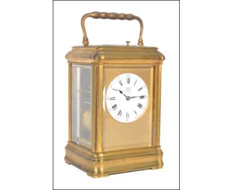 A large 19th century Dent of 61 Strand, London gilt brass framed French carriage clock.&nbsp; The case with 5 bevelled glass 