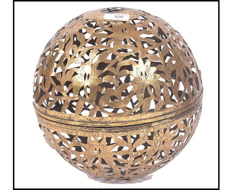 A 19th century Persian Islamic large brass incense burner globe having pierced decoration being later converted to a light fi