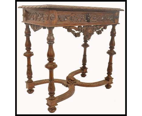 A good 19th century Italian Renaissance&nbsp;walnut console table, boldly carved with a turned reeded legs united by cross ov