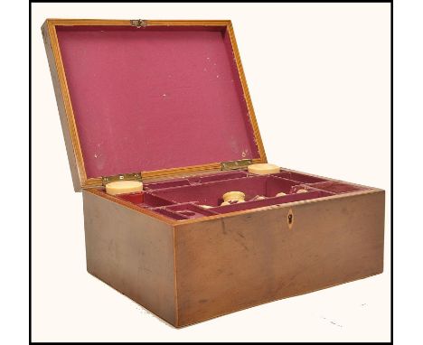 An 18th century Georgian mahogany work box having box wood inlay. The hinged lid opening to reveal a fully appointed interior