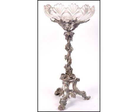 A fantastic 19th century Elkington silver plated epergne centrepiece raised on scrolled acanthus leaf tripod legs with the ce