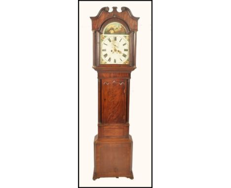 An 18th / 19th century North country mahogany longcase grandfather clock. The mahogany case and trunk with painted face havin