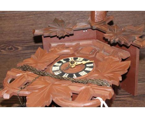 IMPRESSIVE HUBERT HERR TRIBERG GERMANY STAGS HEAD HUNTING CUCKOO CLOCK
with a carved mounted stags head pediment over the cuc