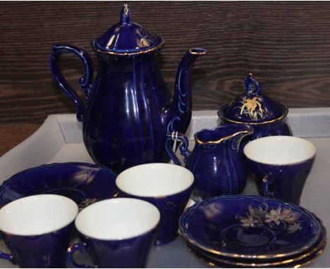 20TH CENTURY TEA SERVICE
comprising a teapot, a cream and sugar, with four cups, and with six saucers; each decorated with st