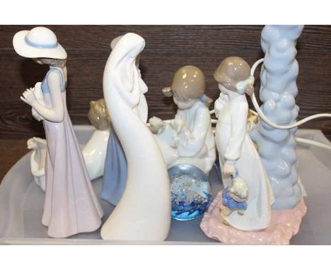 COLLECTION OF SIX NAO FIGURES
including children figures, rabbiits and a lamp base of a girl; together with a paperweight and