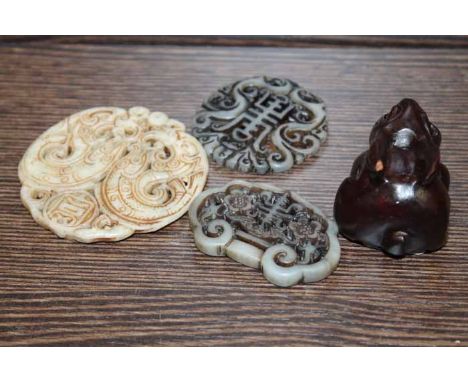 COLLECTION OF HARDSTONE ORNAMENTAL CHINESE CARVED AMULETS
together with a wooden Netsuke modelled as a rabbit (4)
