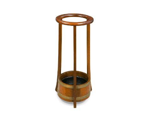 An Arts and Crafts coopered oak and mahogany stick/umbrella stand, by R.A.Lister & Co, with three gently curving uprights mee