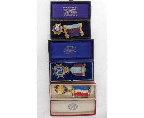 A silver gilt and enamel Royal and Ancient Order of the Buffalos jewel, dated 1926
Further silver gilt jewel dated 1924 and a