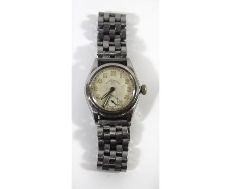 A vintage Rolex Oyster stainless steel wristwatch 
The circular dial with Arabic numerals and subsidiary seconds dial, the ca