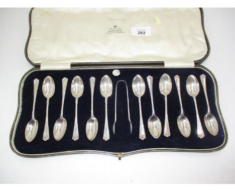 Cased Set of 12 Silver Tea Spoons and Tongs, London 1909 