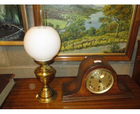 Mantel Clock and an Oil Lamp 
