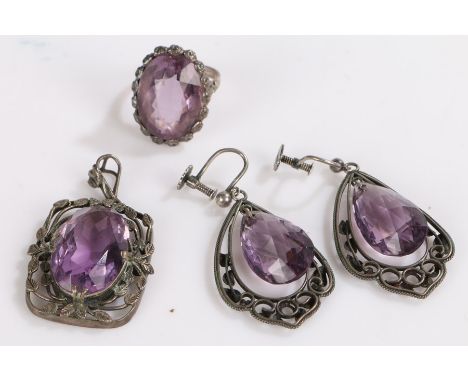 Simulated amethyst set pendant, ring and pair of earrings, all housed in white metal settings, 20.4g (4)