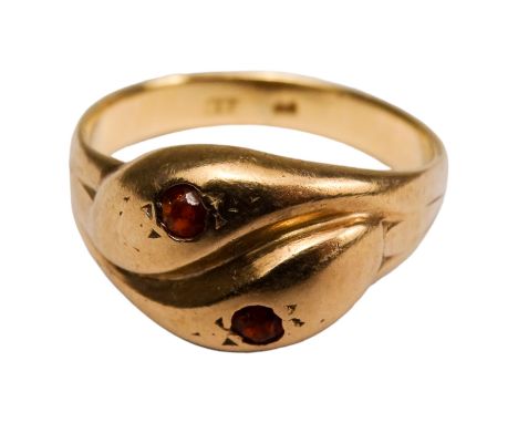 A 9ct yellow gold snake ring - set red stones, size R/S, weight 4.4g. 