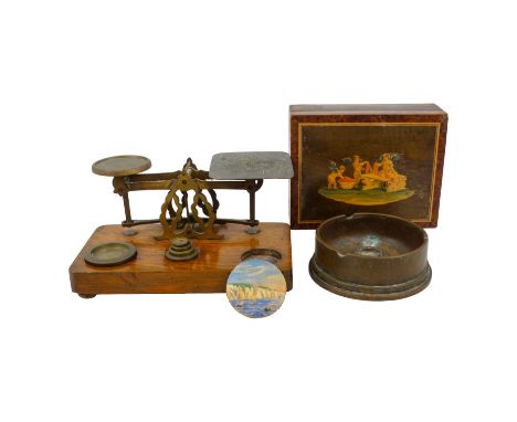 A set of brass postal scales - with oak base and selection of graduated weights, together with a box and an ashtray modelled 