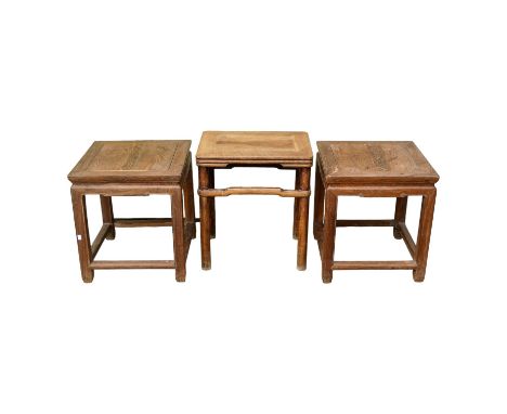 A late 19th century Chinese rectangular oriental hardwood table - the cleated panel top on turned legs joined by high periphe