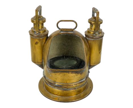 An early 20th century brass binnacle compass by W. Ludoph of Warnemunde - the domed canopy incorporating illumination from ei